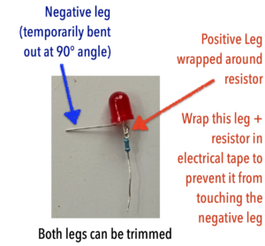 Image shows LED with resistor wrapped around positive leg, negative leg temporarily bent out
